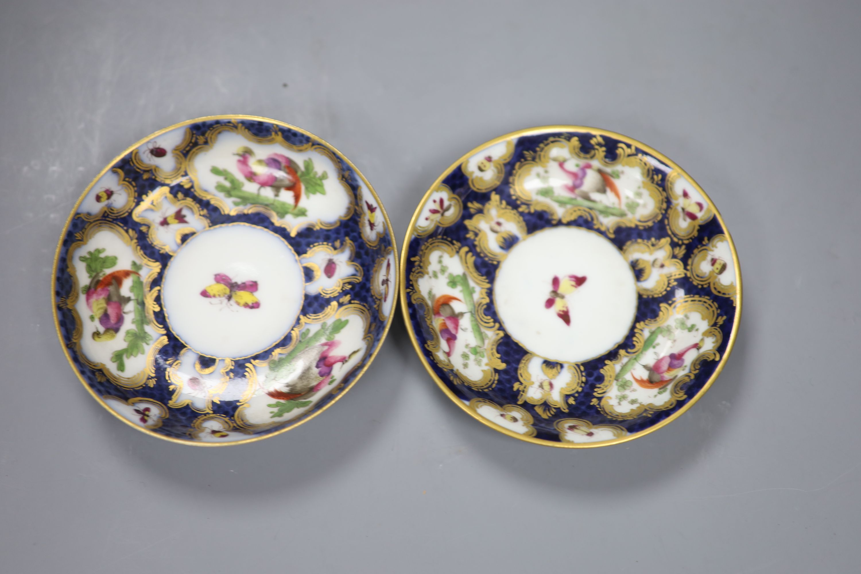 A pair of Samson copies of First Period Worcester porcelain cups and saucers, height 6cm
